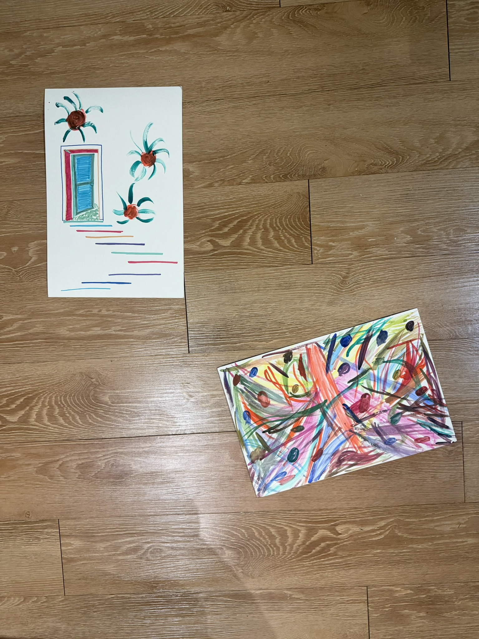 Stacie and I made some paintings. Mine is the weird streaky one, Stacie's has the flowers.