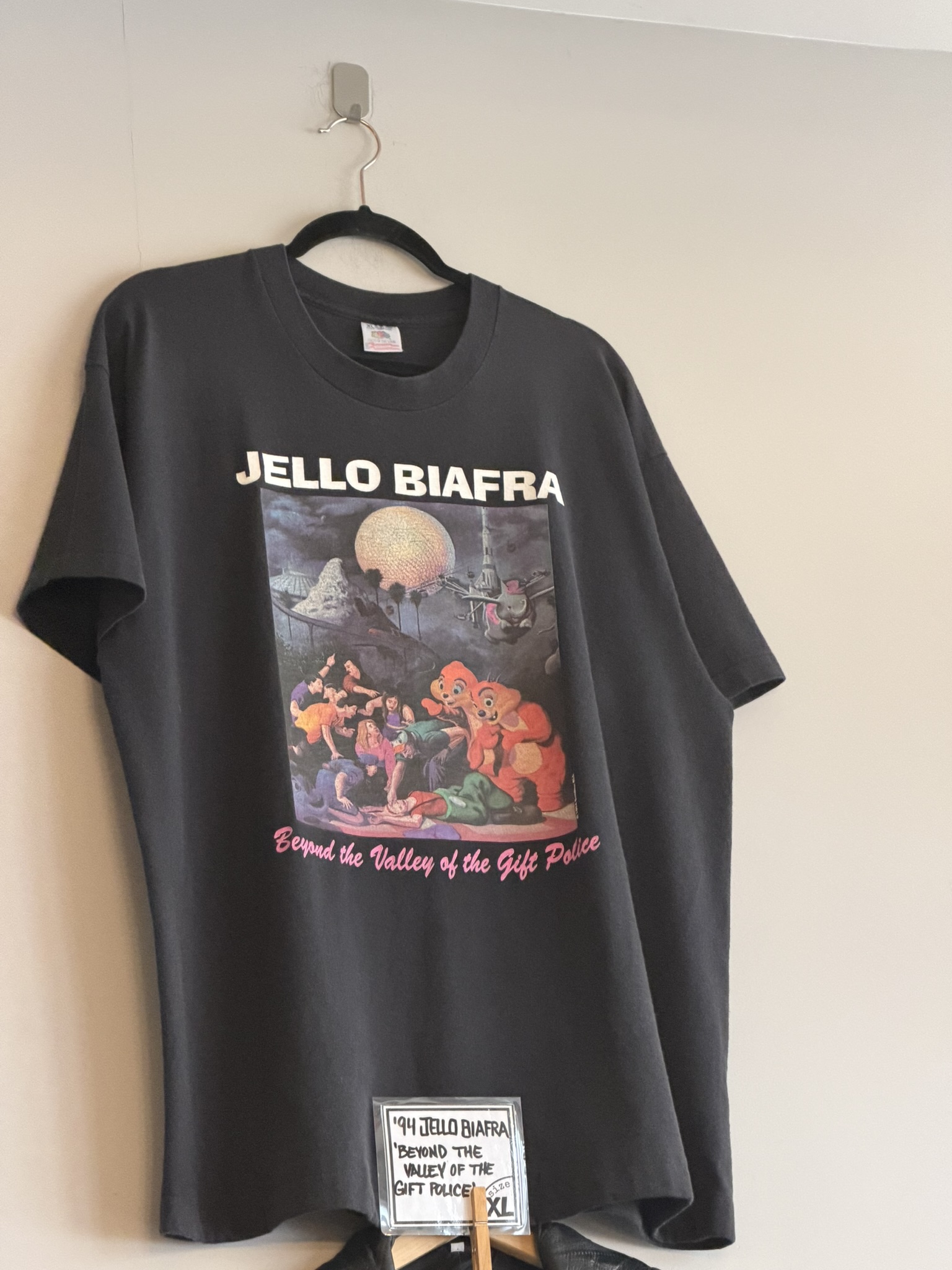 Shirt with Graphic and Text that says Jello Biafra hanging in Found Vintage Store in St. Louis, Missouri.