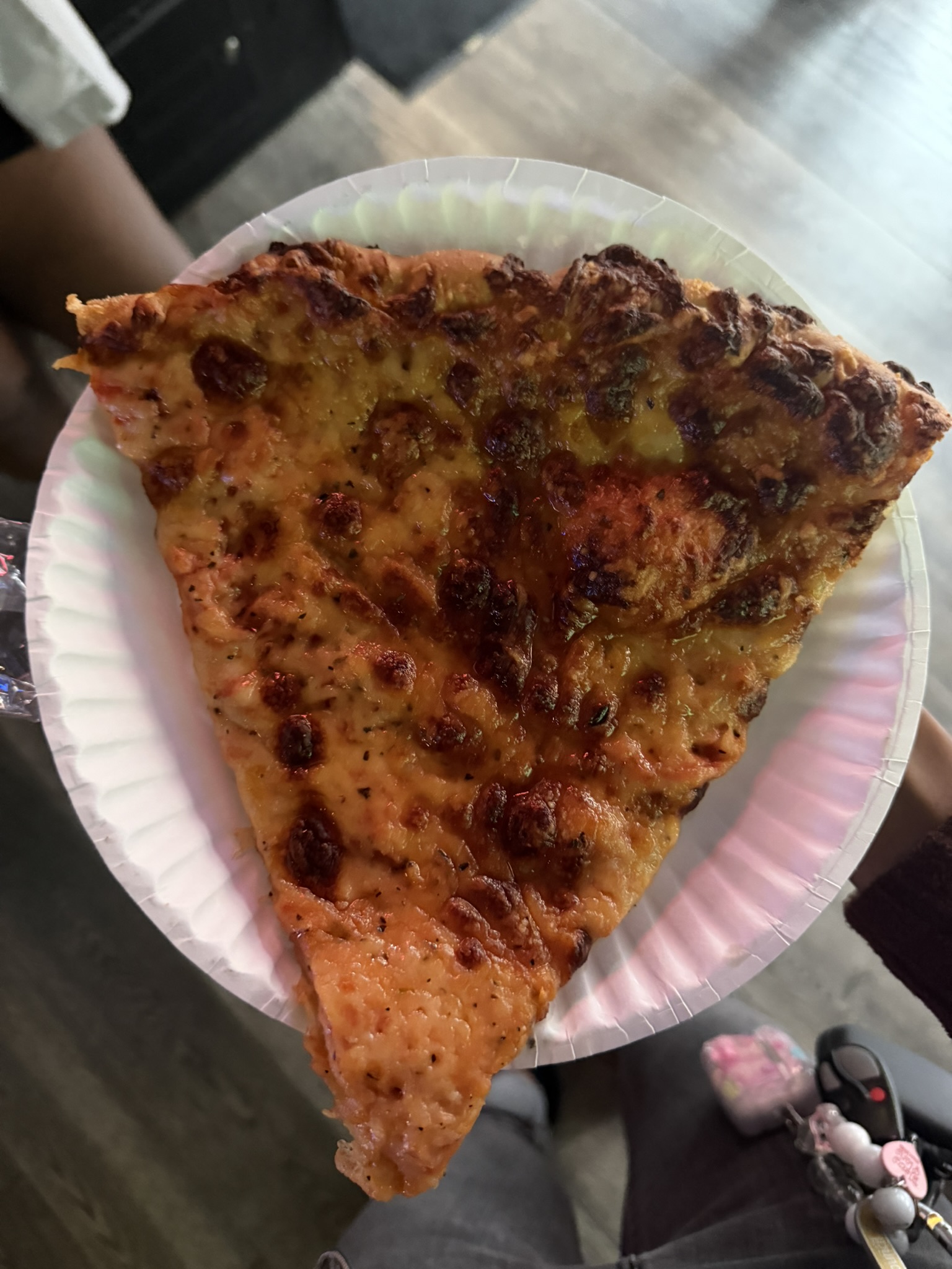 Big slice of pizza from Up Down Arcade Bar.