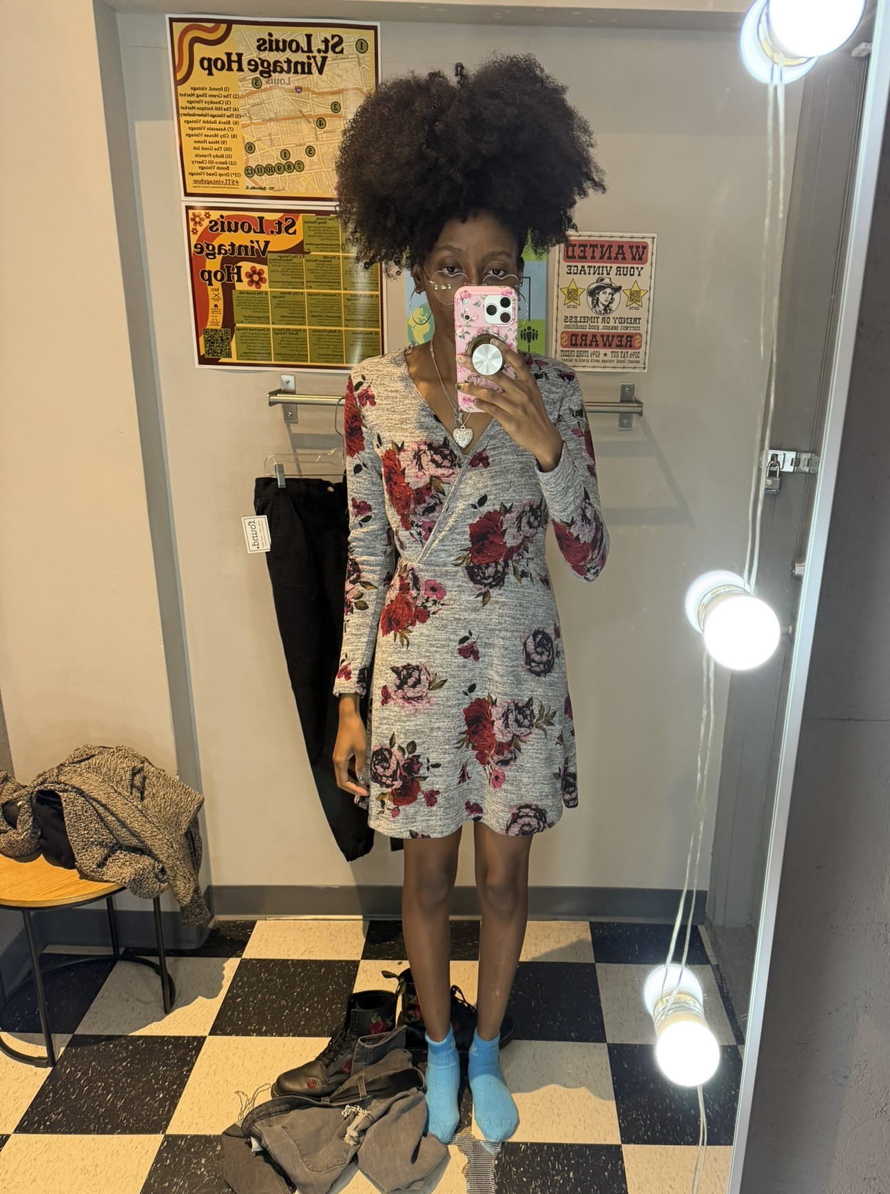 Me trying on the gray dress with roses I bought from Found Vintage.